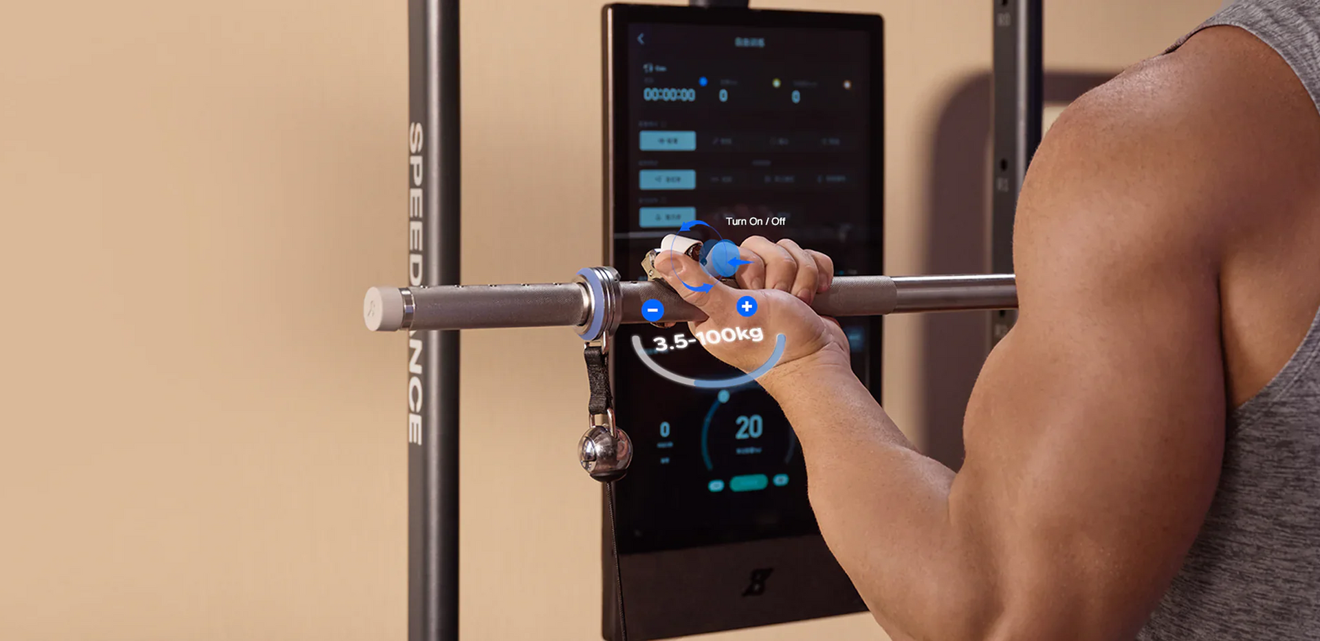 Person adjusting gym equipment with a digital display in the background