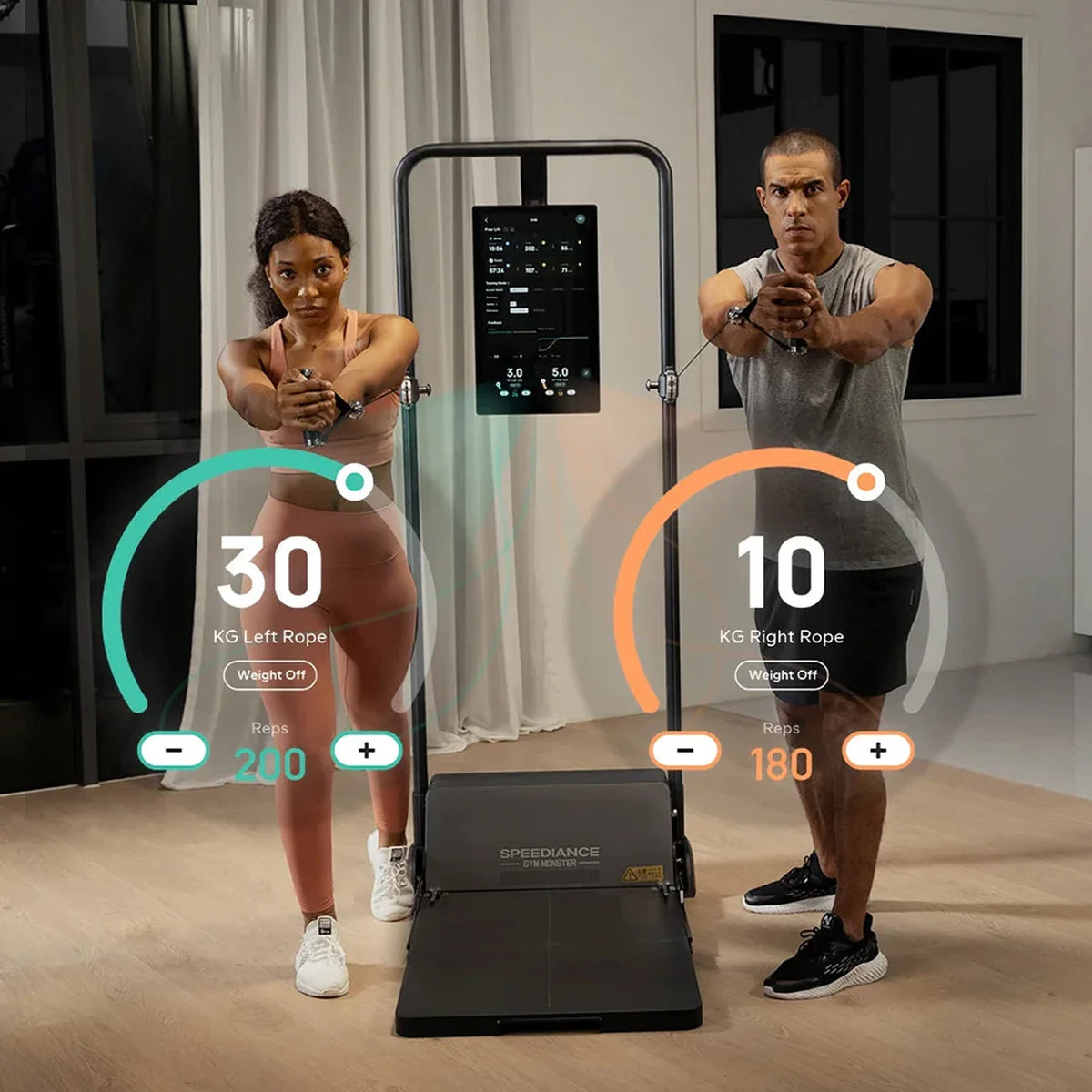 Two people using a SpeedANCE home gym system with digital displays showing weight settings.