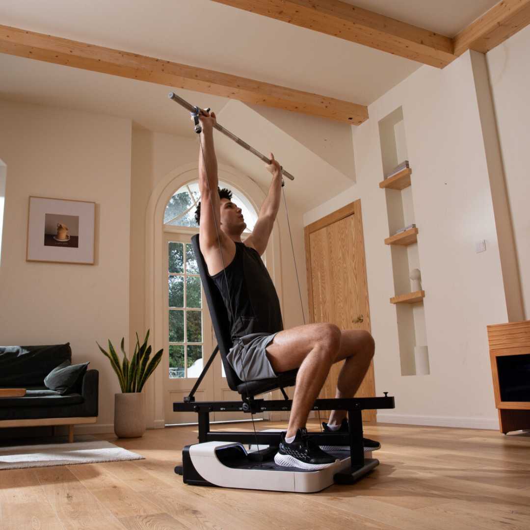Sitting and doing exercise on Smart Gym Lite